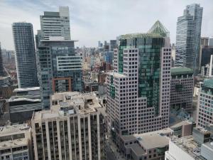 an aerial view of a city with tall buildings at Entertainment District, Downtown Toronto - 300 Front 1 Bed 1 Bath, City View in Toronto