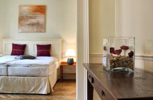 Postel nebo postele na pokoji v ubytování Boutique Hotel Nautilus