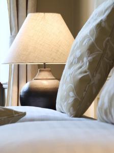 Postel nebo postele na pokoji v ubytování Boutique Hotel Nautilus