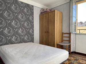Posteľ alebo postele v izbe v ubytovaní Appartement 3 pièces 4 pers à 100m de la plage, centre-ville, balcon, TV, lave-linge, ménage inclus - FR-1-225C-116