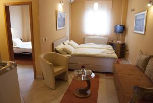 Postel nebo postele na pokoji v ubytování Hotel Portal + 37 fotografií
