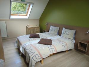 Postel nebo postele na pokoji v ubytování B&B Tlekkerbeddeke