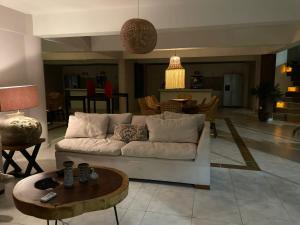 Posezení v ubytování Hermoso Departamento en Cozumel, con vista al mar caribe C9