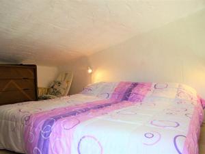 A bed or beds in a room at Appartement Le Lavandou, 2 pièces, 4 personnes - FR-1-251-205