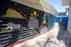 a mural on the side of a garage at THE LITTLE PRINCE BOUTIQUE HOTEL in Antalya