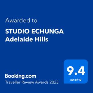 a blue sign with the text awarded to studio enovoacco adelaide hills at STUDIO ECHUNGA Adelaide Hills in Echunga
