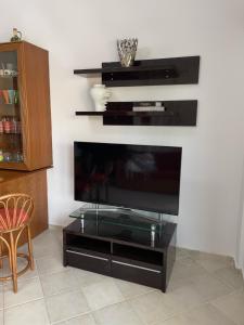 TV a/nebo společenská místnost v ubytování Fenia's house