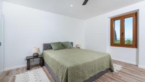 Postel nebo postele na pokoji v ubytování Boomerang - Holiday House with sea view