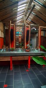 a bathroom with a bench in a room at Aha Lanta Cozy Hostel in Ko Lanta