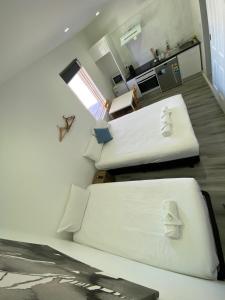 מיטה או מיטות בחדר ב-Central Motel Mudgee