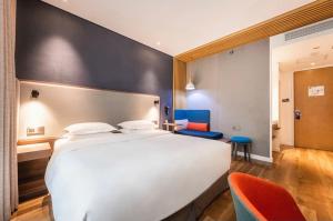 Postel nebo postele na pokoji v ubytování Holiday Inn Express Hefei Shushan by IHG