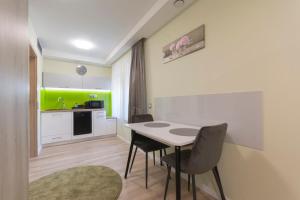 A seating area at PontJó Apartman Miskolc
