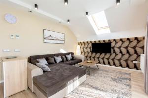 A seating area at PontJó Apartman Miskolc