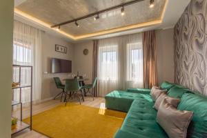 A seating area at PontJó Apartman Miskolc