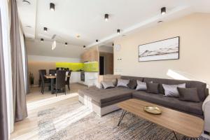 A seating area at PontJó Apartman Miskolc