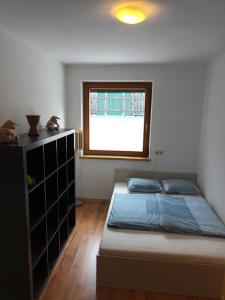 Letto o letti in una camera di Ferienwohnung mit Terrasse