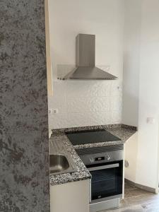 Kuchyňa alebo kuchynka v ubytovaní Cozy apartment Costa Adeje