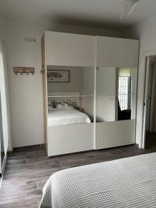 Posteľ alebo postele v izbe v ubytovaní Cozy apartment Costa Adeje