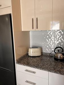 Kuchyňa alebo kuchynka v ubytovaní Cozy apartment Costa Adeje
