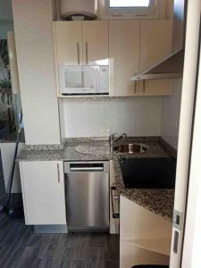 Kuchyňa alebo kuchynka v ubytovaní Cozy apartment Costa Adeje