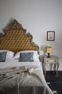 A bed or beds in a room at Dimora Caffaro
