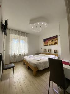 Postel nebo postele na pokoji v ubytování Vapama Rooms