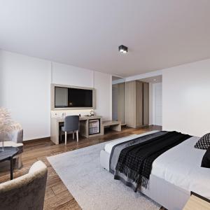 a bedroom with a bed and a desk and a tv at Silivri Park Hotel in Silivri +37 photos