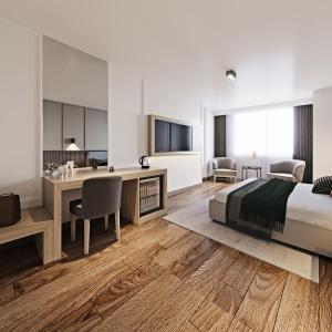 a bedroom with a bed and a desk at Silivri Park Hotel in Silivri