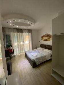 Postel nebo postele na pokoji v ubytování Vapama Rooms