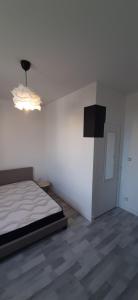 Posteľ alebo postele v izbe v ubytovaní Colocation maison - Villeurbanne près de Lyon