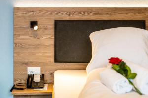 Postel nebo postele na pokoji v ubytování Hotel Kristall-Saphir Superior