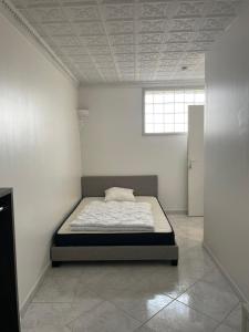 Posteľ alebo postele v izbe v ubytovaní Colocation maison - Villeurbanne près de Lyon