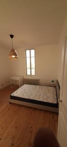 Posteľ alebo postele v izbe v ubytovaní Colocation maison - Villeurbanne près de Lyon