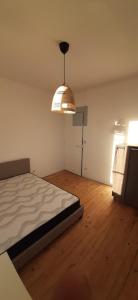 Posteľ alebo postele v izbe v ubytovaní Colocation maison - Villeurbanne près de Lyon