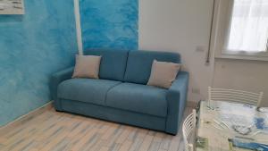A seating area at Appartamento ADRIANA