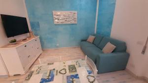 A television and/or entertainment centre at Appartamento ADRIANA