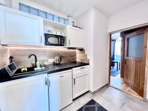 Kuchnia lub aneks kuchenny w obiekcie Villa Tatrydom