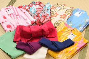 a pile of ties sitting on top of a table at Onyado Shikishima-kan in Kotohira