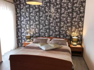 Posteľ alebo postele v izbe v ubytovaní Villa Suzy-Apartments Suzana