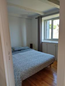 Posteľ alebo postele v izbe v ubytovaní Maison avec vue exceptionnelle et piscine privative