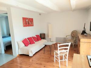 Posedenie v ubytovaní Maison avec vue exceptionnelle et piscine privative