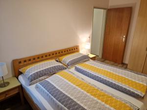Giường trong phòng chung tại Sonnhof-Christianhof, Appartement