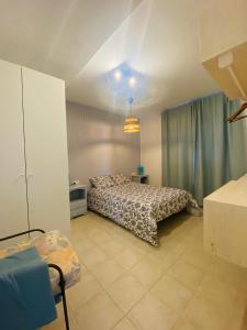 a bedroom with a bed in a room at Sun&Beach 5 in Caleta De Fuste