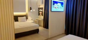 Postel nebo postele na pokoji v ubytování Mirada Hotel