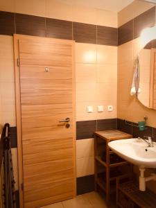 Koupelna v ubytování Apartmán Corvin + 4 fotografie
