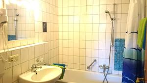 Koupelna v ubytování Haus Rottauenblick + 22 fotografií