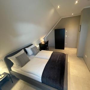 Säng eller sängar i ett rum på Privatzimmer Steinmetz in Reken