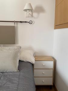 A bed or beds in a room at Casa Vacacional Alcazabilla