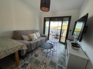 A television and/or entertainment centre at Casa Vacacional Alcazabilla