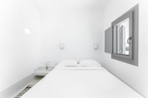 Posteľ alebo postele v izbe v ubytovaní Philosophia Luxury Villa
